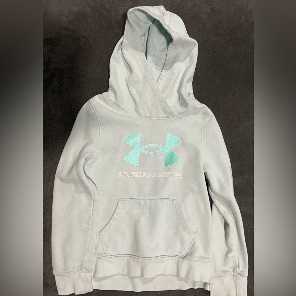 Girls size YSM Under Armour hoodie in light teal.